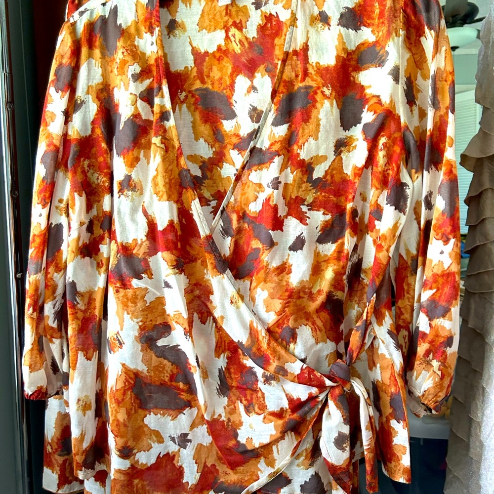 2 piece wrap top with skirt. Hangers do not do the outfit justice!